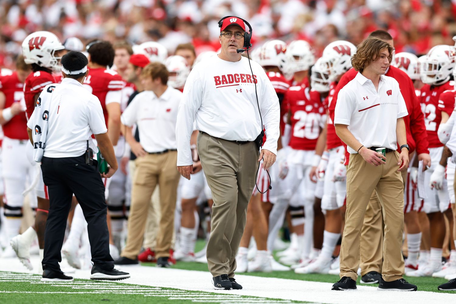 Wisconsin head coach Paul Chryst looking up at the video board against Washington State.